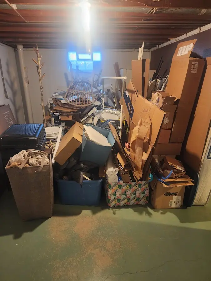 Roll-off dumpster container at job site for 20 Yard Dumpster Rental in Apollo Beach